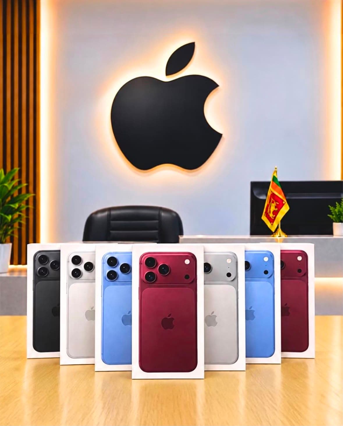 Theekzu Mobile showroom desk featuring illuminated Apple logo, Sri Lankan flag, and iPhone display